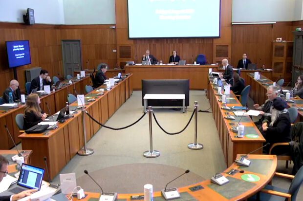 Planning inquiry taking place in a council chamber